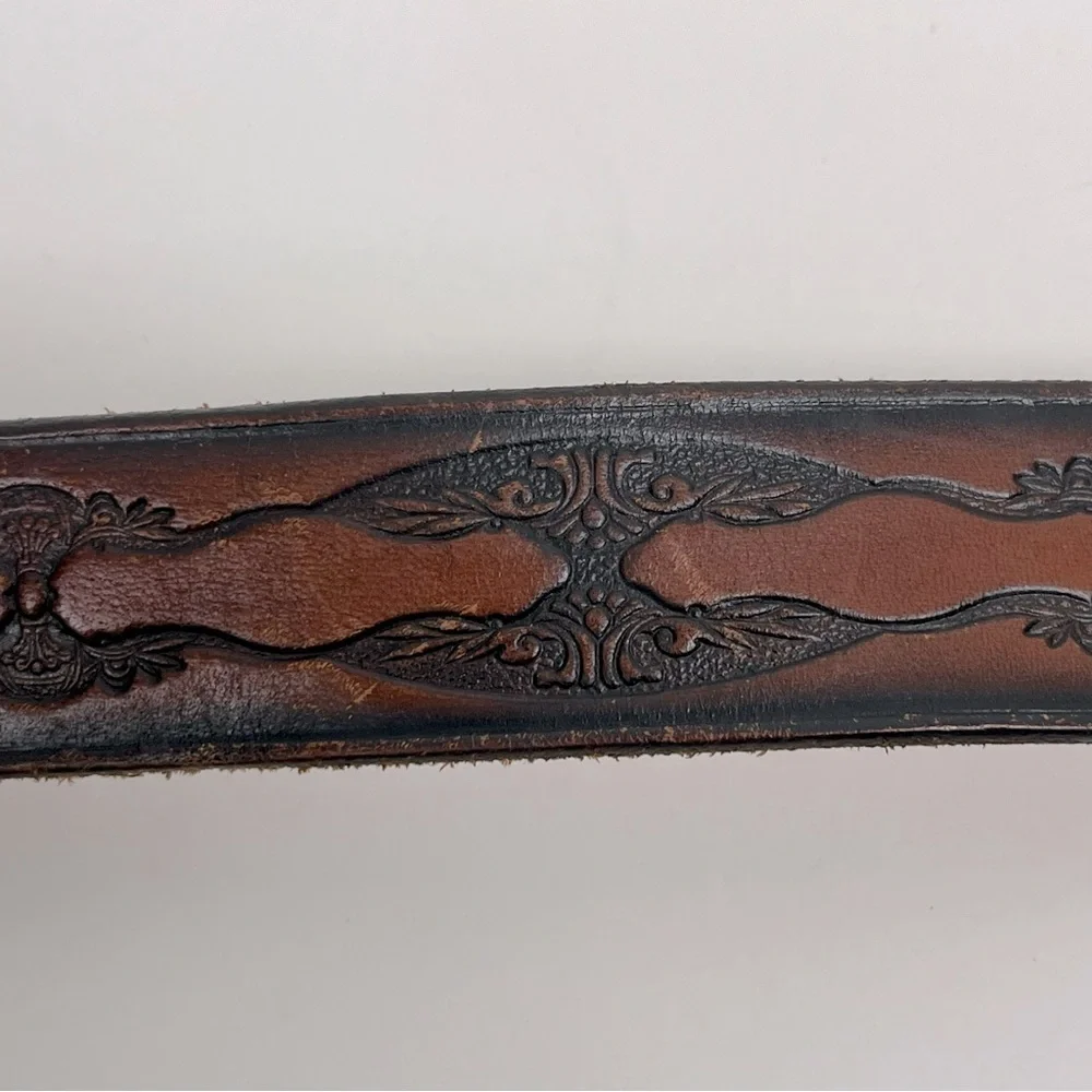 Brown tooled leather belt, unisex, approximately 34” see measurements in photos.